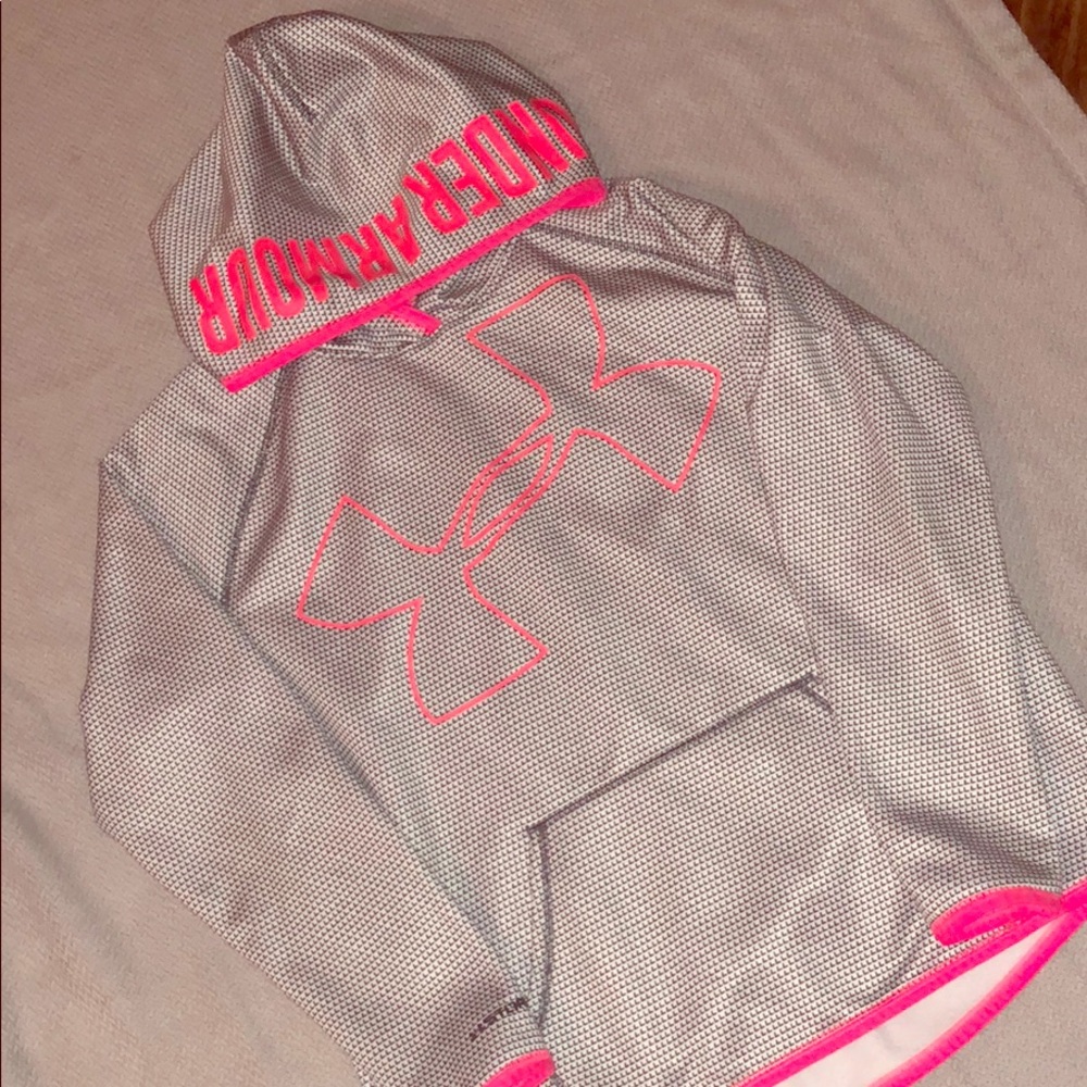 Grey under armor hoodie with pink detailing!